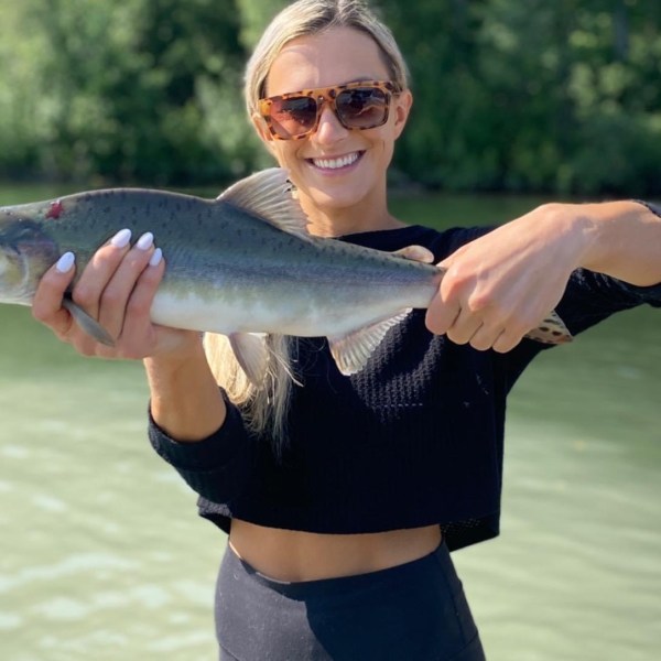 a person holding a fish