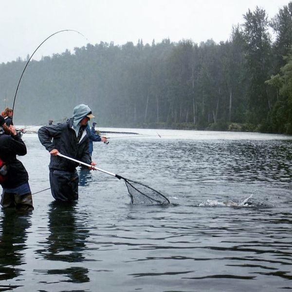 a man water skiing behind a boat