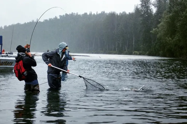 a man water skiing behind a boat