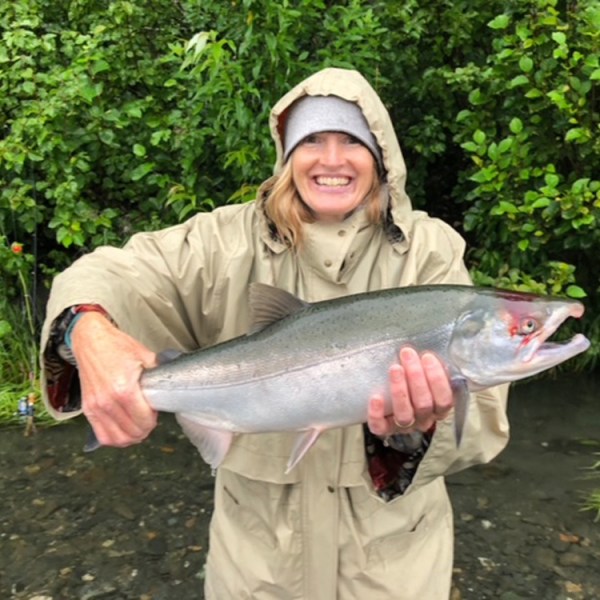 a person holding a fish