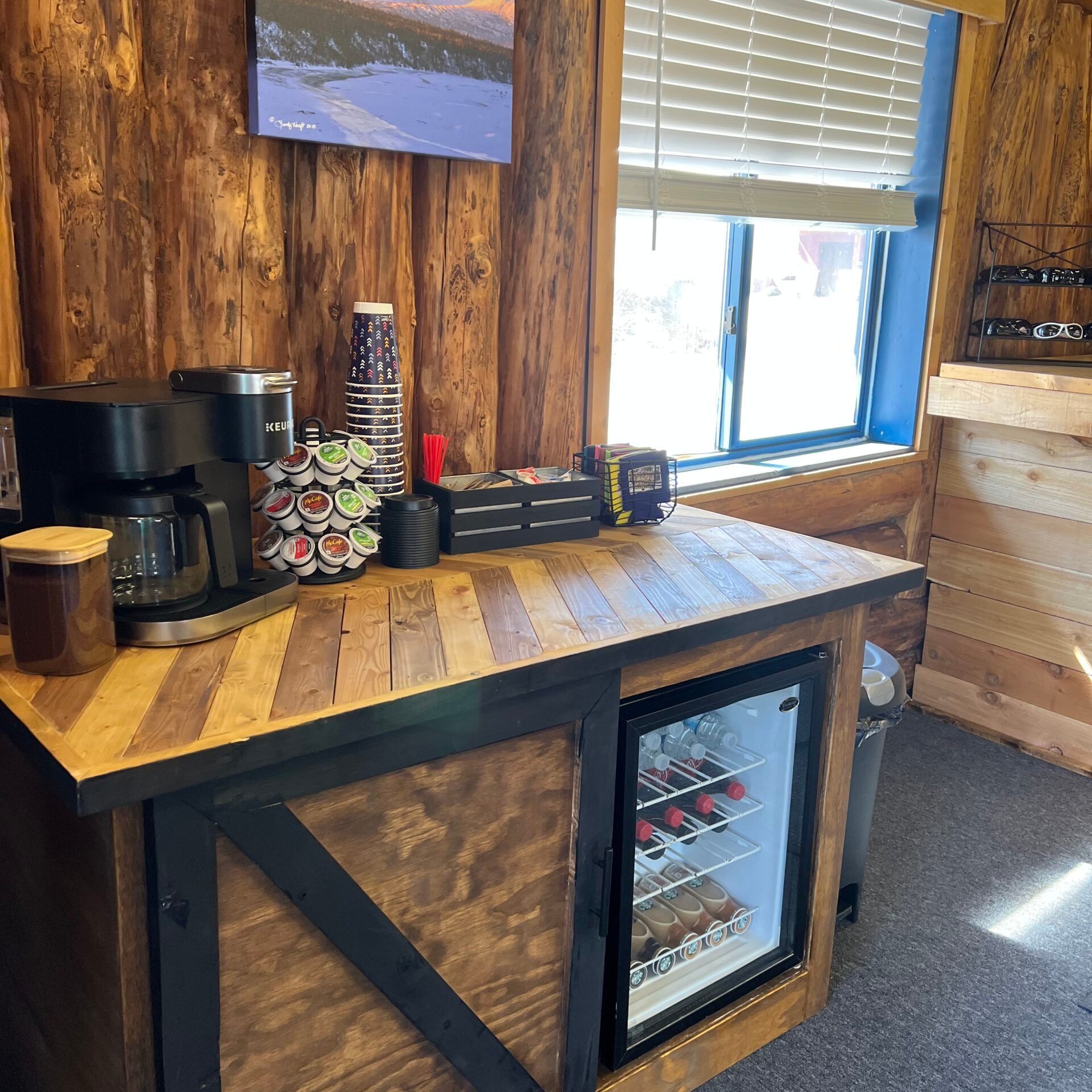 a stove top oven sitting next to a window