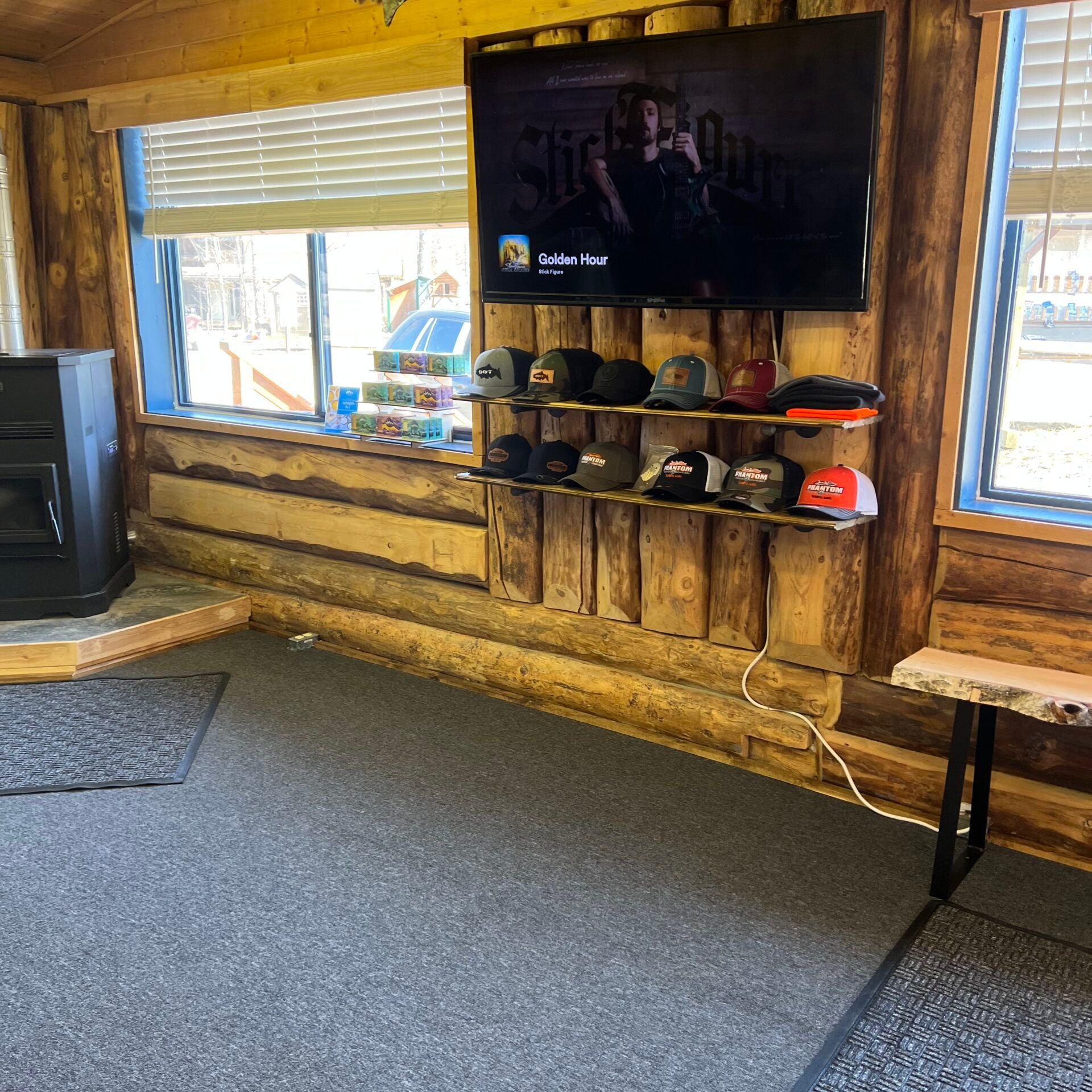 a living room filled with furniture and a large window