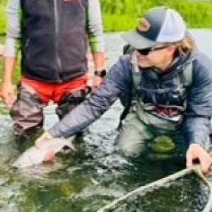 a group of people riding on the back of a boat