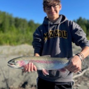a man holding a fish